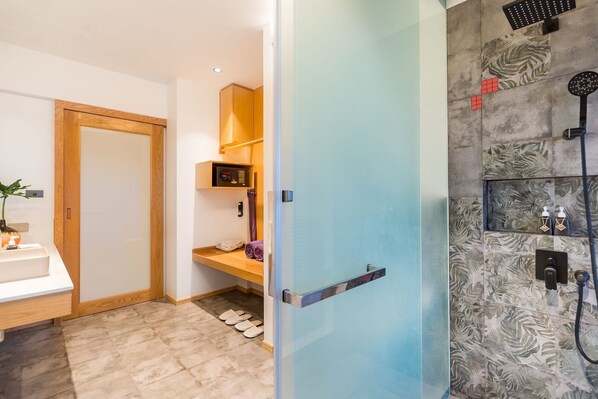 A modern bathroom with a glass shower door, a wooden vanity, and a built-in heater. - La Vida Samui (Koh Samui)