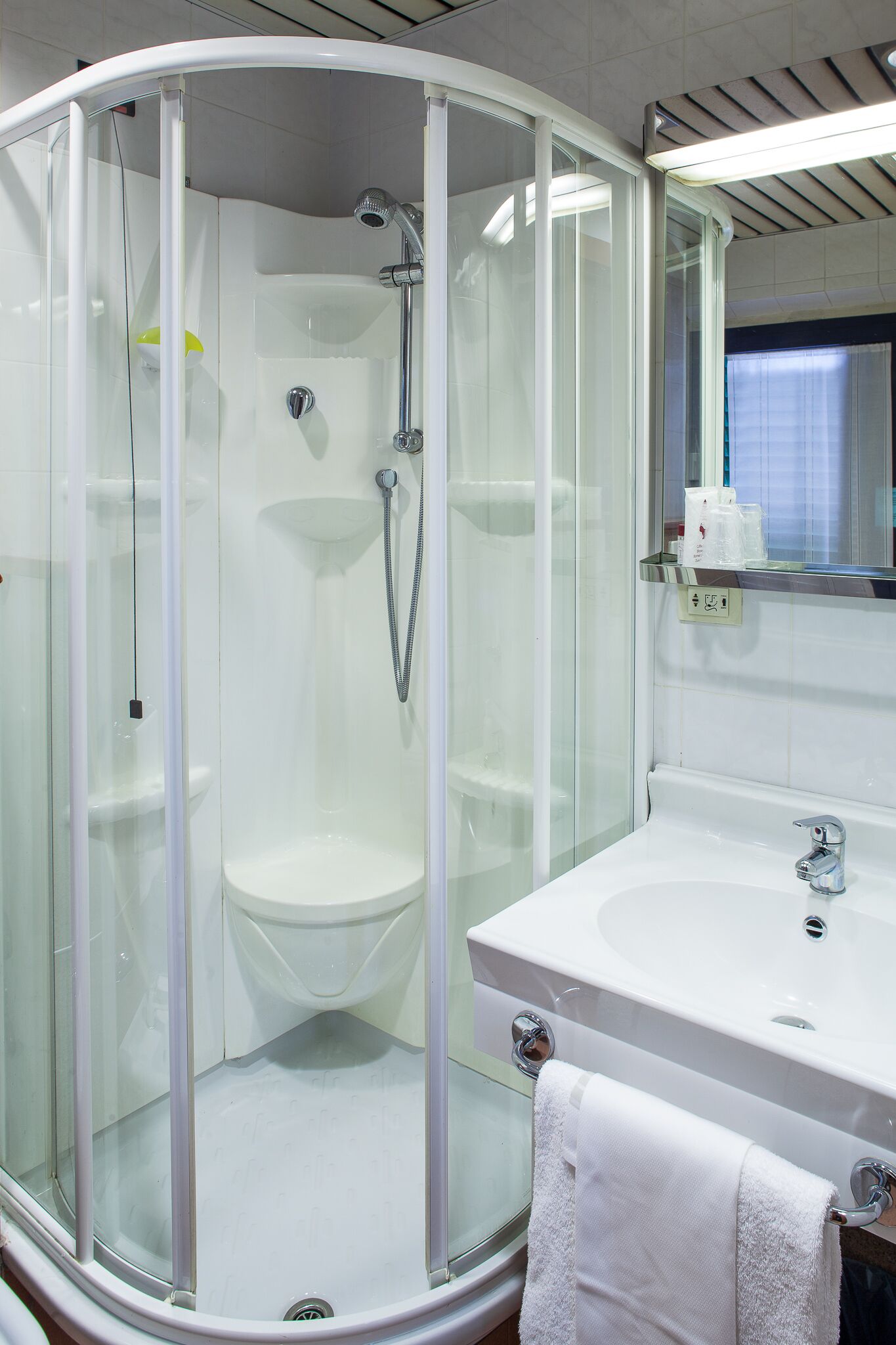 free toiletries, hair dryer, bidet, towels