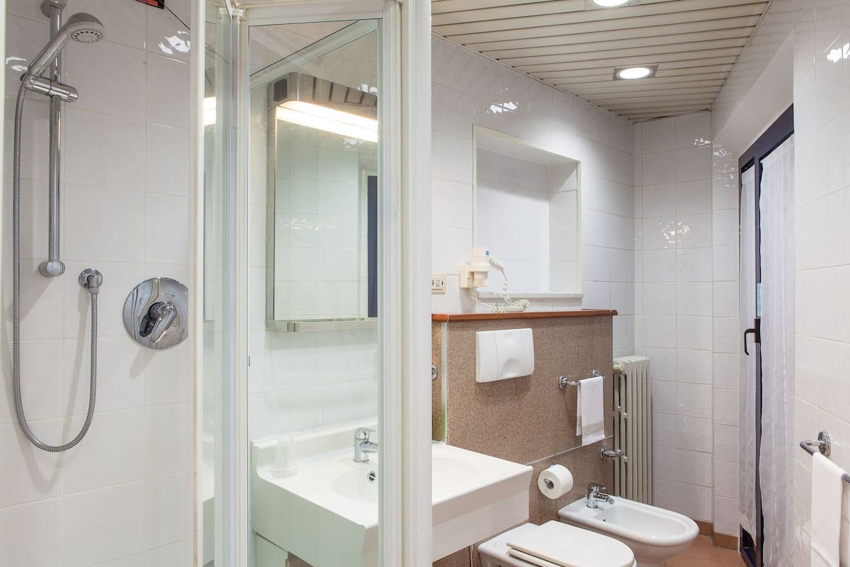 twin room | bathroom | free toiletries, hair dryer, bidet, towels
