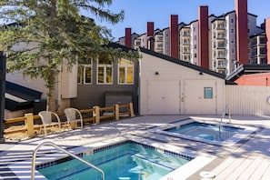 Relax by the pool with lounge chairs and a metal ladder for easy access.
