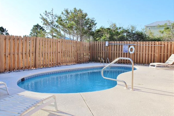 Big private pool with Adirondack loungers