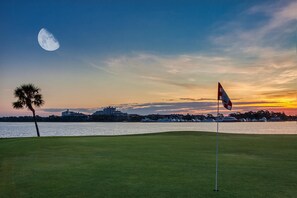 Enjoy a serene golfing experience with a clear view of the water and well-maintained fairways.