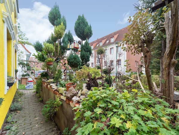 Stroll through the charming residential area, surrounded by lush greenery and traditional European architecture.