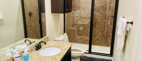 Combined shower/tub, toilet paper