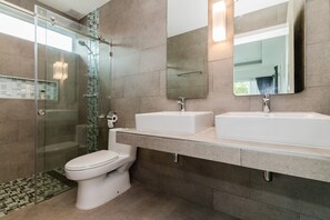 Shower, hair dryer, towels, soap