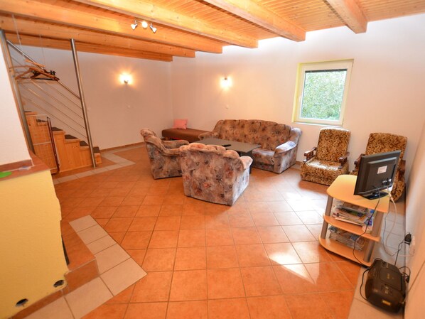 Ferienhaus | Wohnzimmer | Kamin