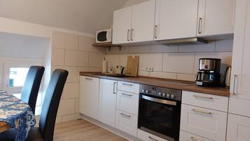 Apartment | Private kitchen | Microwave, stovetop, dishwasher, high chair
