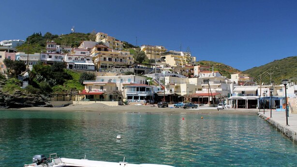 A boat named "Bali Port" docked at a harbor with buildings in the background. - Quaint Holiday Home in Pasalites with Garden near Perama (Mylopotamos)