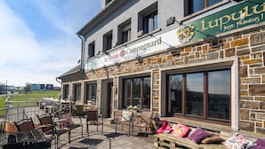 A restaurant named "Le Relais Campagnard" with outdoor seating and a view of the countryside. - Gouvy Getaway Holiday Home (Gouvy)