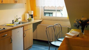 Apartment | Private kitchen | Coffee/tea maker, fridge, microwave, oven - Welcoming Apartment With Garden in Kühlungsborn (Kuehlungsborn)