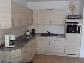 Apartment | Private kitchen | Fridge, dishwasher, coffee/tea maker, toaster - Spacious Apartment near Sea in Graal-Muritz (Graal Mueritz)
