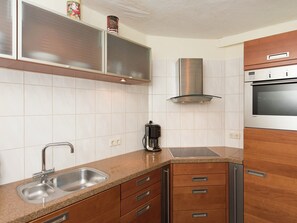 Casa | Cozinha privada | Cadeirão de bebê