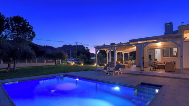 A swimming pool with a covered patio area, outdoor furniture, and a view of the surrounding landscape. - Casa Bianca Villa in Kolympia (Kolympia)