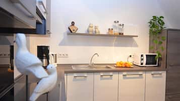 Apartamento | Cozinha privada | Cadeirão de bebê
