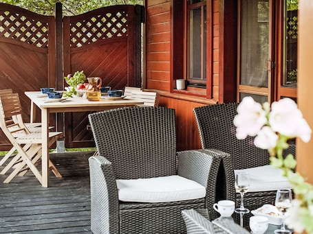 Outdoor dining. U Prababci Olgi by Interhome