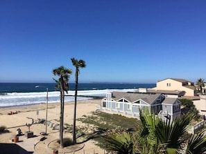 On the beach, sun loungers, beach towels