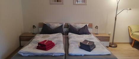 2 bedrooms, travel crib, WiFi, bed sheets