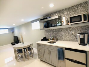 Fridge, microwave, coffee/tea maker, toaster