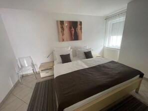 1 bedroom, travel crib, WiFi, bed sheets