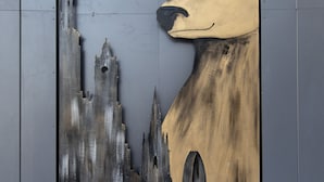 A framed artwork of a deer head with antlers and a cityscape. - voco Edinburgh-Haymarket by IHG (Edinburgh)