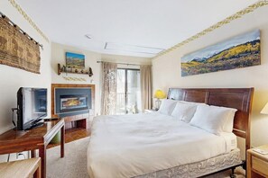 2 dormitorios, tabla de planchar con plancha, cuna de viaje y Internet