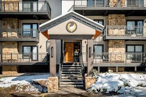 Stunning multi-story building with a grand entrance and elegant balconies.