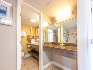 Combined shower/tub, hair dryer, towels, shampoo