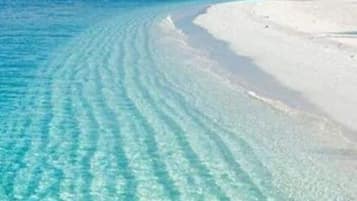 On the beach, beach towels