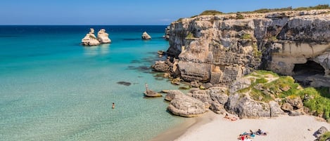 Sulla spiaggia, teli da spiaggia