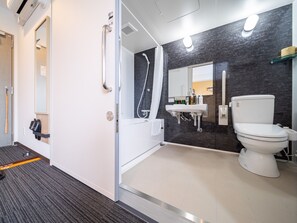 Combined shower/bathtub, deep-soaking bathtub, towels