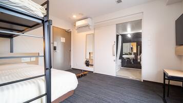 Desk, laptop workspace, free WiFi, bed sheets