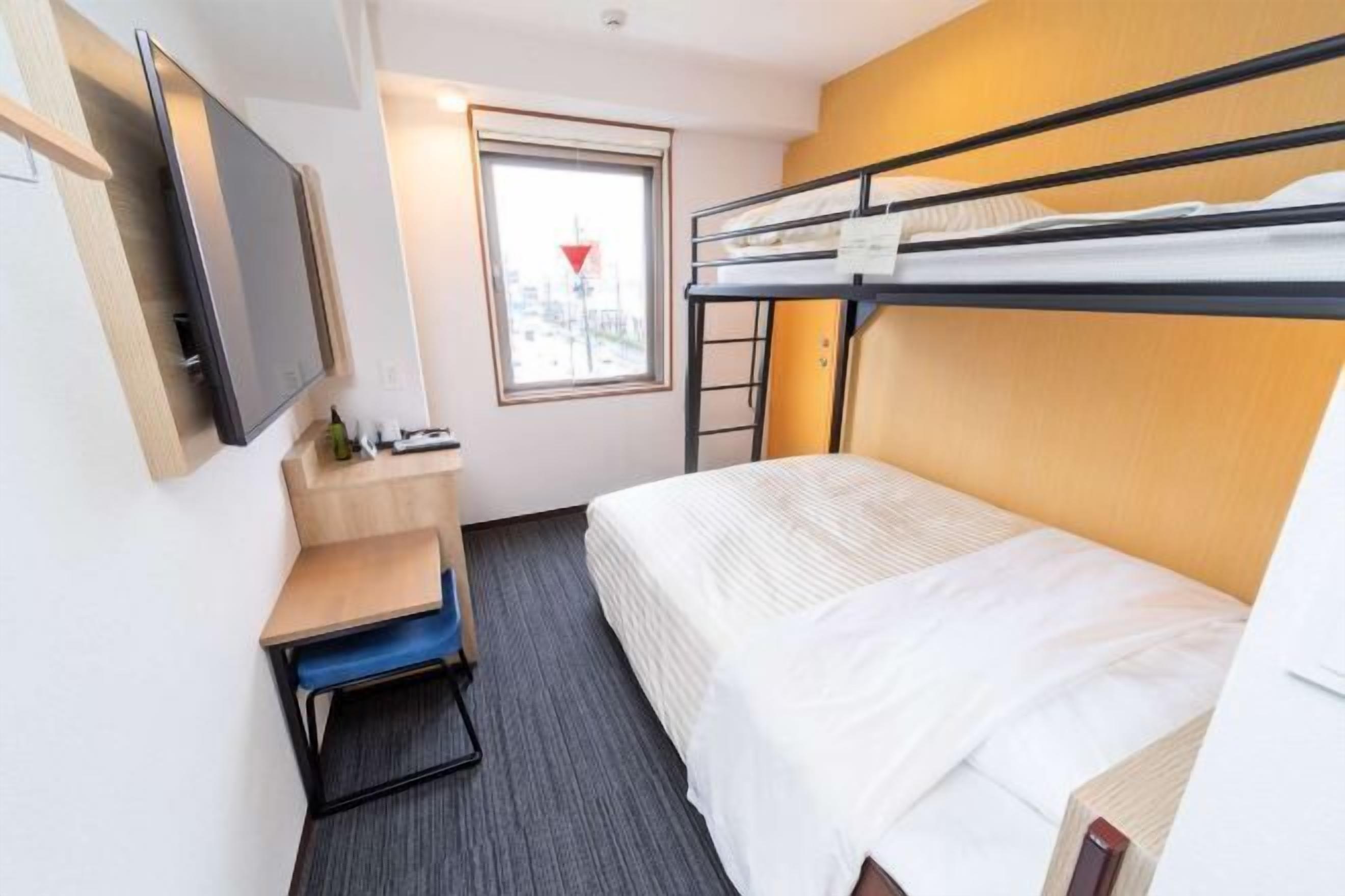 Desk, laptop workspace, free WiFi, bed sheets