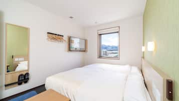 Desk, laptop workspace, free WiFi, bed sheets