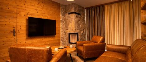 Flat-screen TV, fireplace