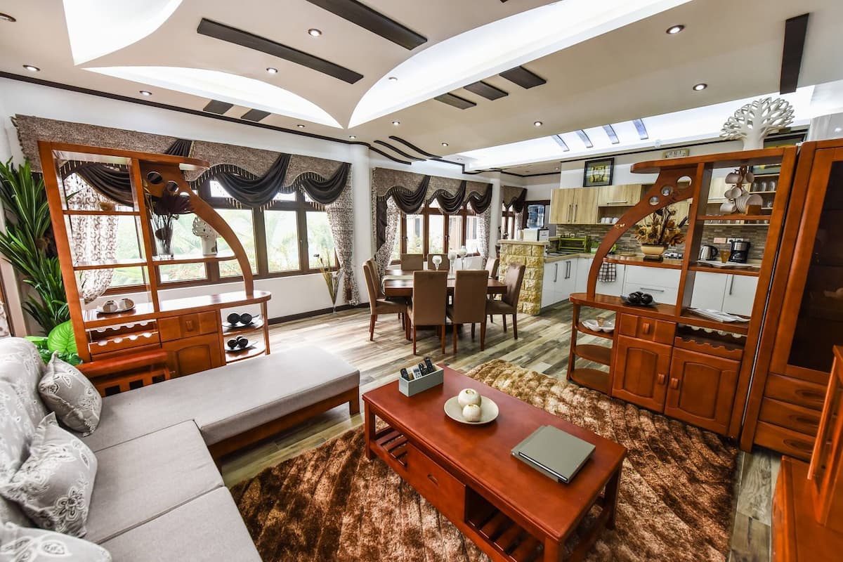 Deluxe Apartment | Living area | TV