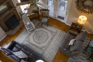 Smart TV, fireplace, books, video library