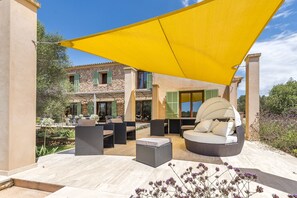 Terrace/patio - Luxurious air conditioned contemporary finca with large heated pool (Cas Concos)