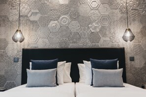 Quartos à prova de som, Wi-Fi de cortesia, roupa de cama