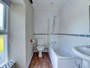 Kombinasi shower/bathtub dan handuk