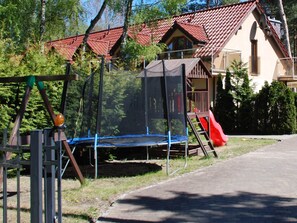 Enjoy a family-friendly stay in this home with a spacious balcony and a trampoline for kids to bounce around.