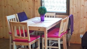 Dining - A Holiday Home With a View of Wilkasy Lake. Living Room, 2 Bedrooms, Barbecue (Gizycko)