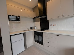Apartment | Private kitchen | Microwave, oven, stovetop