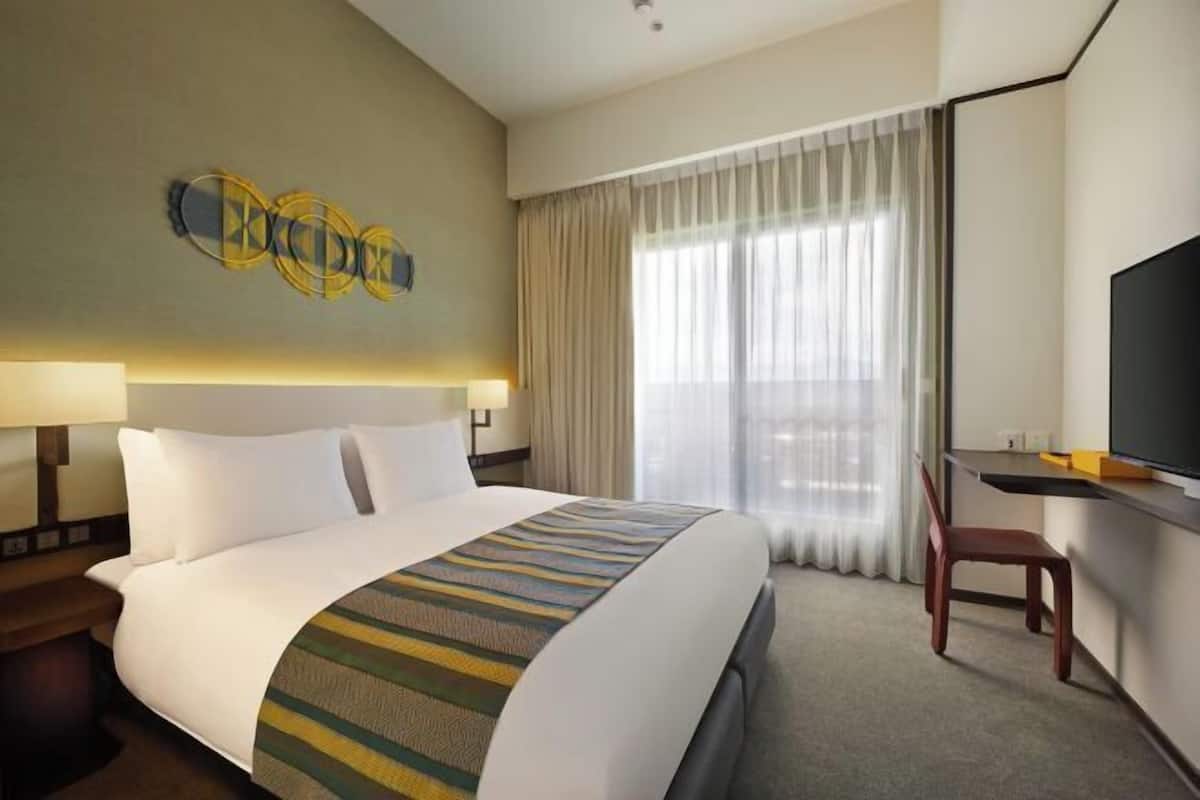 Premium bedding, down duvets, in-room safe, laptop workspace