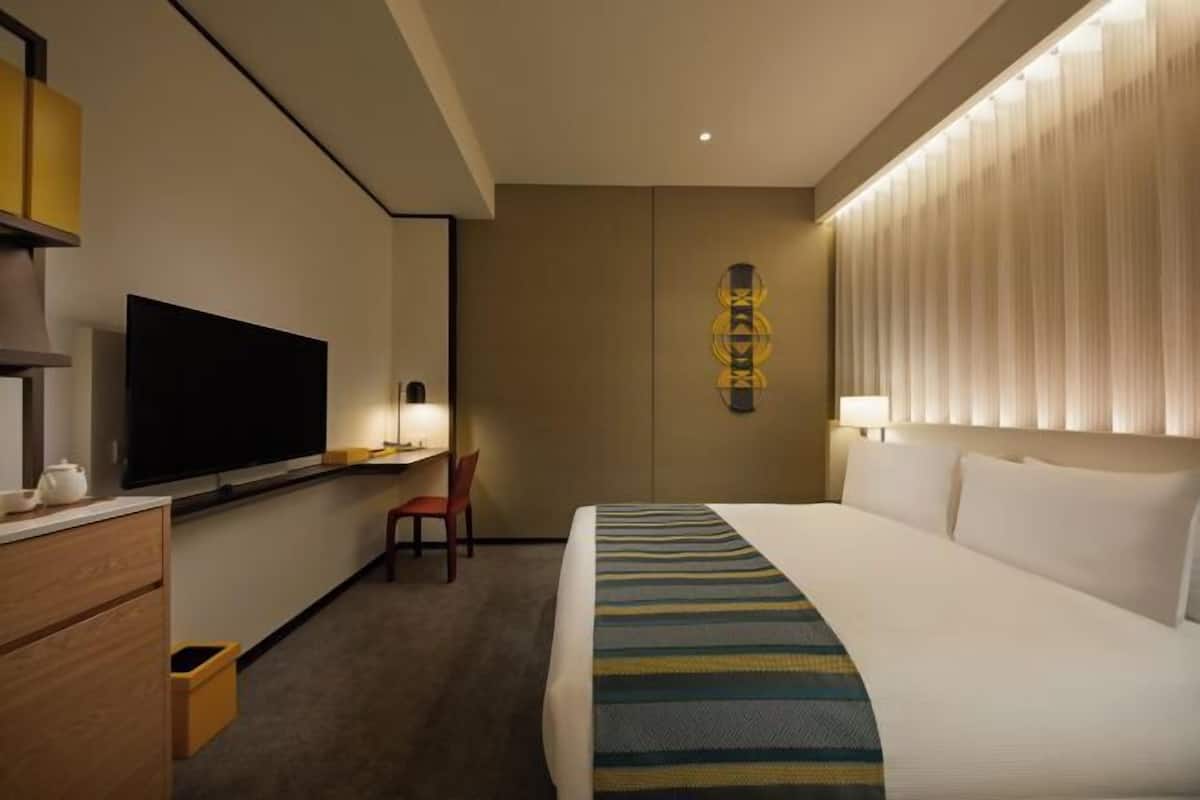 Premium bedding, down duvets, in-room safe, laptop workspace