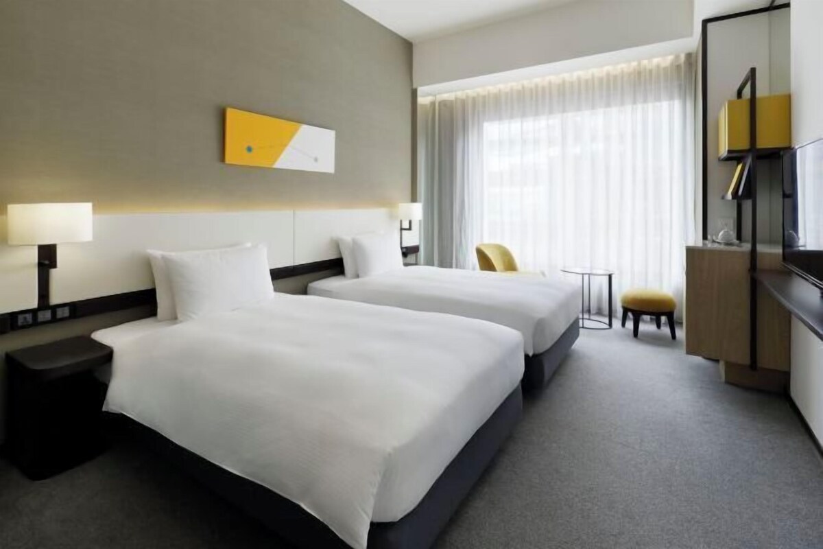 Premium bedding, down duvets, in-room safe, laptop workspace