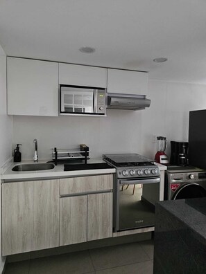 Fridge, microwave, oven, stovetop
