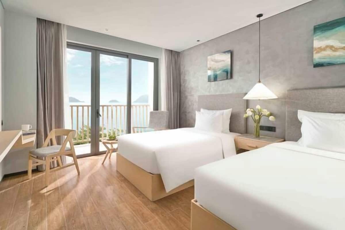 Premium bedding, memory foam beds, minibar, in-room safe