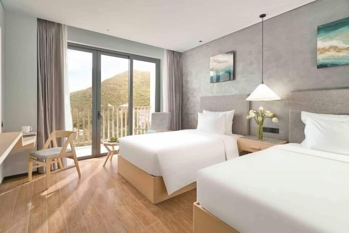 Premium bedding, memory foam beds, minibar, in-room safe