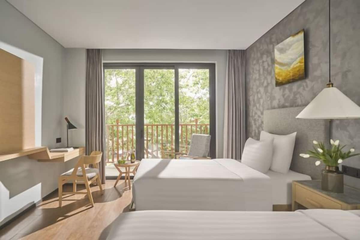 Premium bedding, memory foam beds, minibar, in-room safe