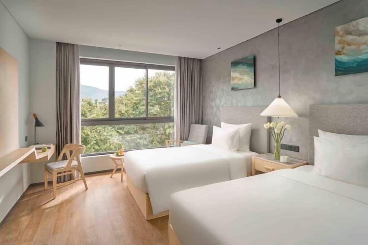 Premium bedding, memory foam beds, minibar, in-room safe
